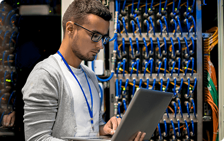 Man Managing Supercomputer Servers